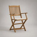 Sedia da giardino pieghevole con braccioli in legno massello di acacia marrone con cuscino crema, 56 x 58 x 90 cm