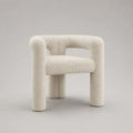 Poltrona imbottita bianco crema in tessuto bouclé, forma arrotondata, 70 × 65 × 73 cm